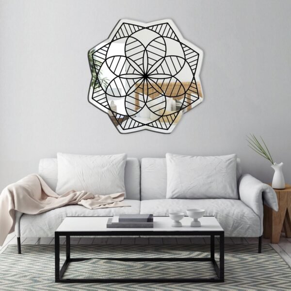 A mirror featuring a kaleidoscope-style mandala design, with vibrant, symmetrical patterns radiating outwards.