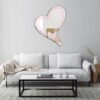 A mirror with a pink cool heart design, offering a vibrant and trendy look.