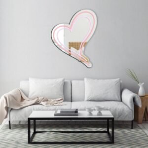 Pink heart-shaped mirror with a glossy finish.