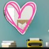 Heart-shaped mirror with a quirky