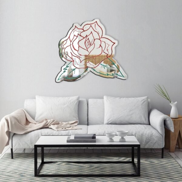 A mirror with a printed rose flower design, offering a soft, elegant touch.