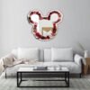 A decorative mirror featuring a floral design inspired by Mickey Mouse, blending whimsical elements with nature.