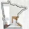 Custom mirror with hand-drawn Minnesota map and landmarks.