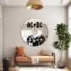 Mirror designed in the shape of a CD featuring AC/DC branding