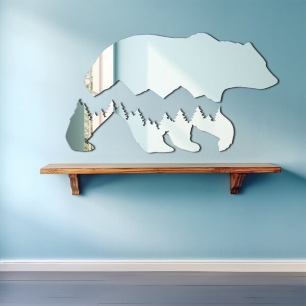 Bear silhouette overlay on mountain mirror.