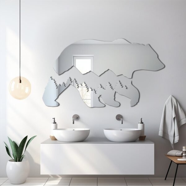 Mirror with bear and mountain range silhouette.