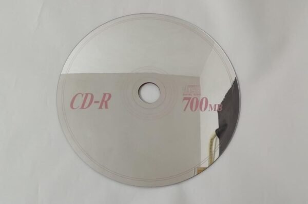 Wall mirror designed in the shape of a CD disc