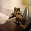 OVO owl mirror in a modern living room setting.