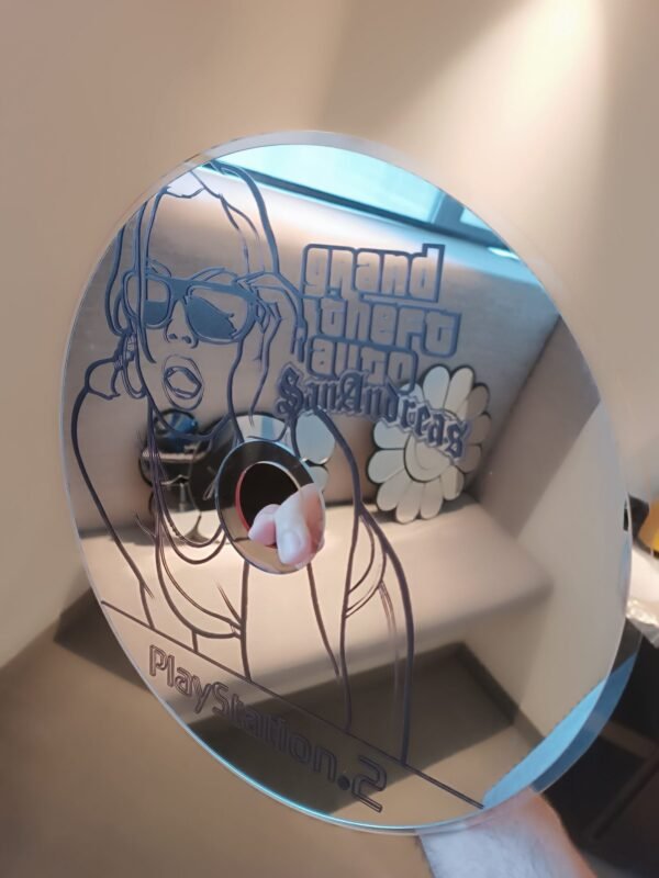 Creative "GTA San Andreas" disc repurposed as mirror.