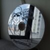 Wall-mounted mirror made from "GTA San Andreas" disc.