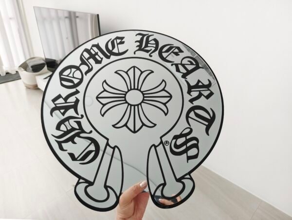 Elegant Chrome Hearts logo mirror for modern decor