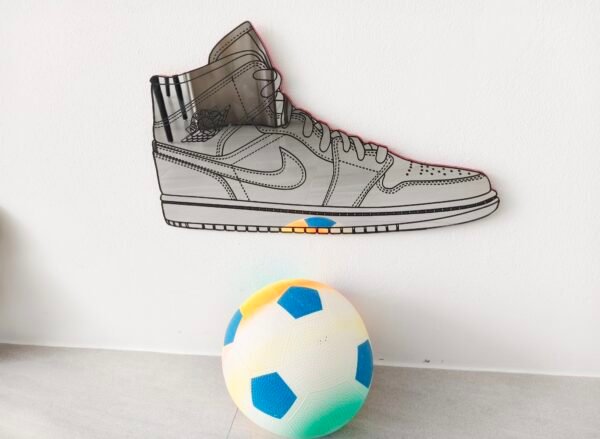 Air Jordan sneaker-shaped mirror for trendy home decor.