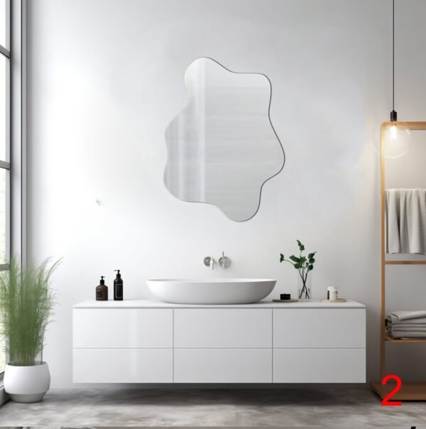 Irregular oval mirror with reflective surface.