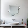 Irregularly shaped mirrors designed to resemble the surface of a pond, ideal for bathroom decor