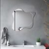 Irregularly shaped mirrors designed to resemble a serene pond for bathroom decor.