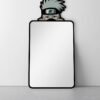 Wall-mounted Kakashi sneaker design mirror.