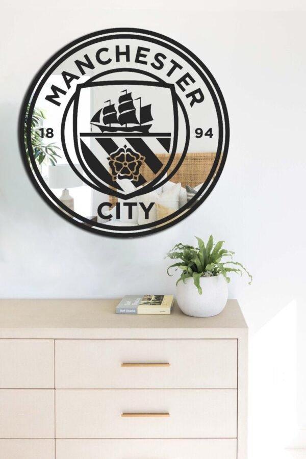 Manchester City logo mirror with adhesive backing for easy installation.