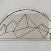 Geometric mountain range wall-mounted mirror.