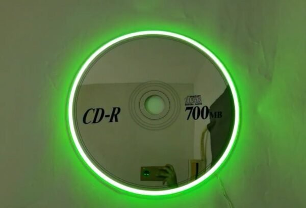 Illuminated RGB CD-shaped mirror.