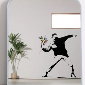 Banksy's 'Rage Flower Bomber' graffiti art printed on a mirror.