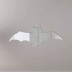 Reflective 'Bat 1' shaped mirror sign with black border.