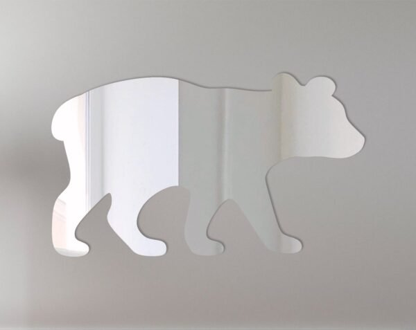 Reflective sign featuring a bear cub illustration.