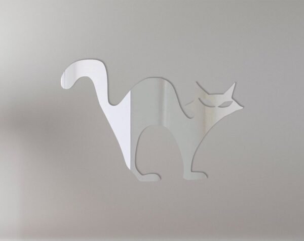 Reflective sign featuring three black cat silhouettes and mirrors.