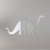 Brontosaurus-shaped mirror with a reflective surface and wooden frame.