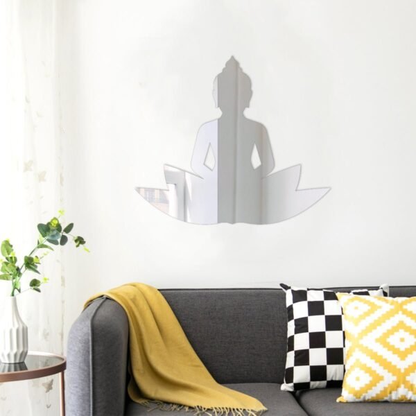 Buddha silhouette with lotus design on round mirror.