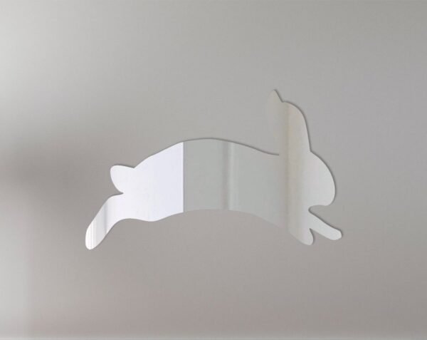 Three-panel mirror with bunny-shaped frames in pastel colors.