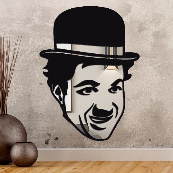 Wall mirror featuring a silhouette of Charlie Chaplin with cane.