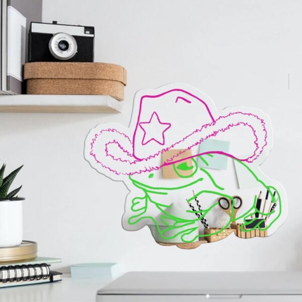 Mirror wall art featuring a playful frog with a cowgirl aesthetic design