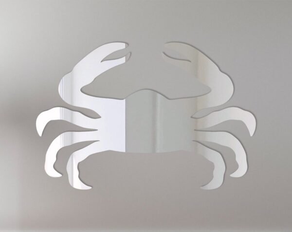 Decorative crab-shaped mirror with 'Welcome' sign.