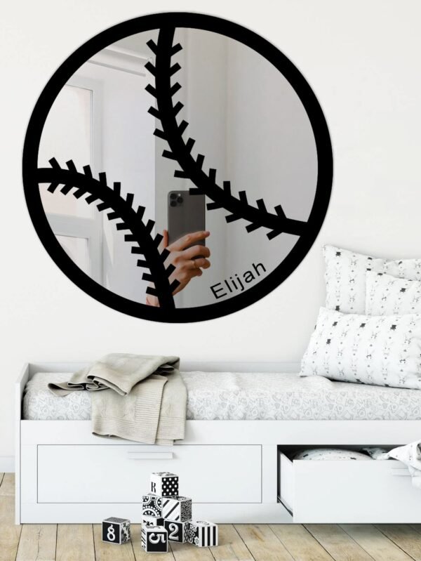 Custom baseball-shaped mirror with personalized name.