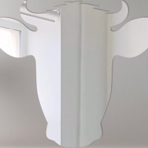 Dairy cow head-shaped mirror with 'Welcome' sign.