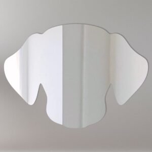 Decorative mirror shaped like a dog's head with text.