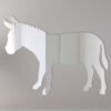 Donkey-shaped mirror with 'Welcome' sign hanging on a rustic wooden fence.
