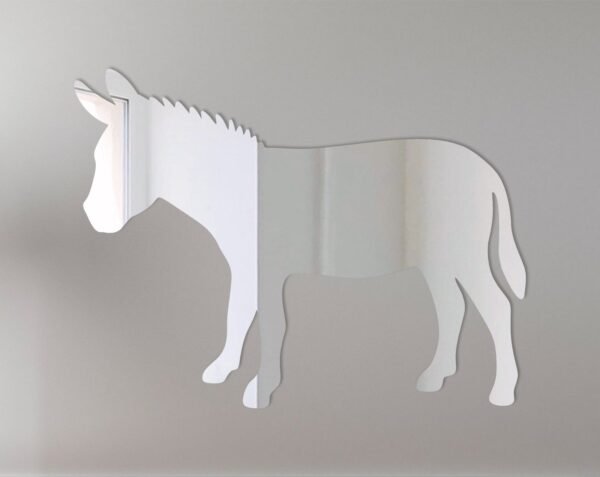 Donkey-shaped mirror with 'Welcome' sign hanging on a rustic wooden fence.