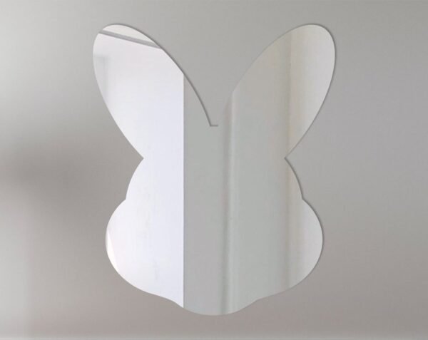 Easter-themed mirror with a bunny head shape and decorative details.