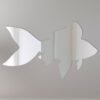 Decorative fish-shaped mirror with 'Welcome' sign.