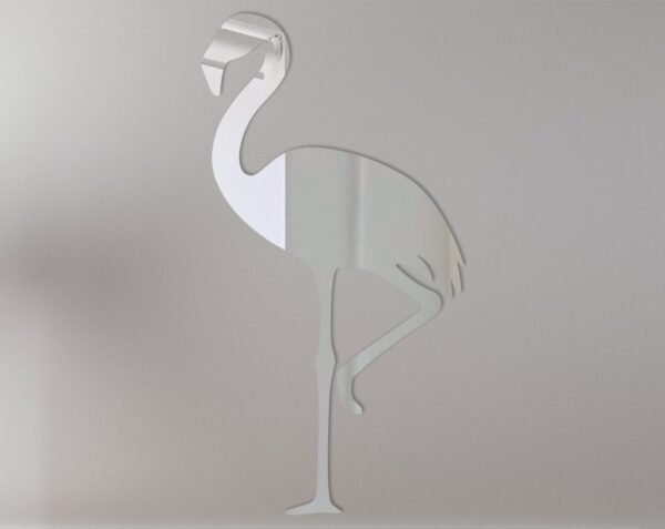 Flamingo-shaped mirror with a neon sign