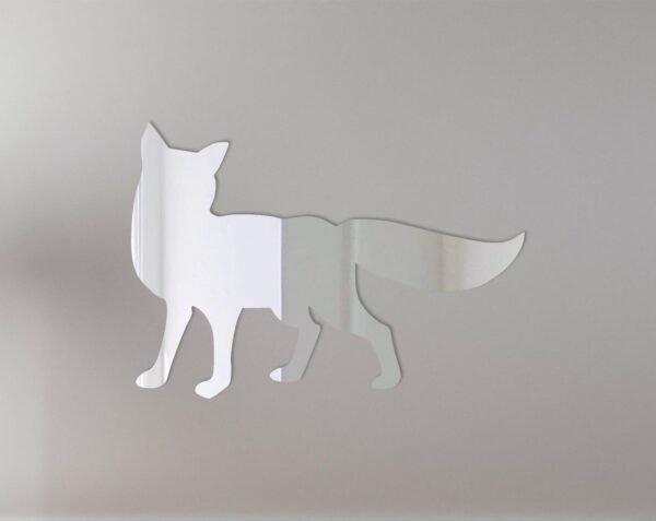 Decorative fox-shaped mirror with ornate border hanging on a wall.
