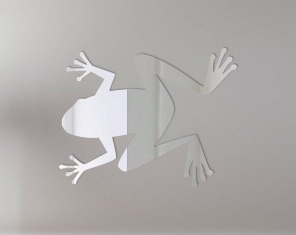 Frog-shaped mirror with a 'Welcome' sign hanging below.