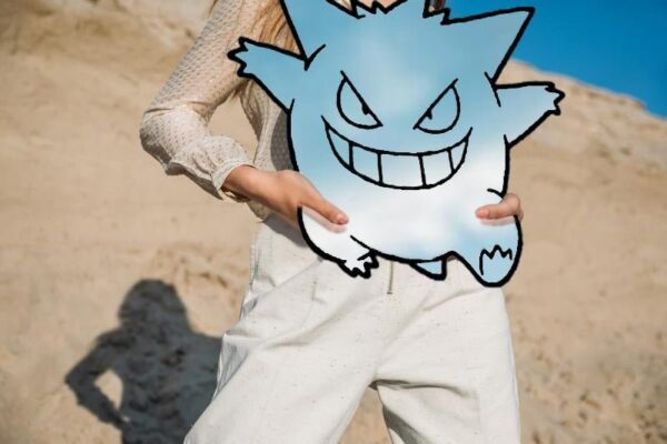 Close-up of Gengar mirror with reflective surface.