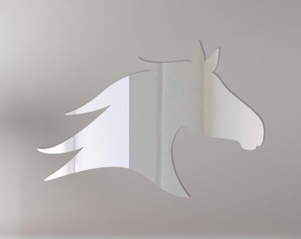 Horse head-shaped mirror with reflective surface and frame.