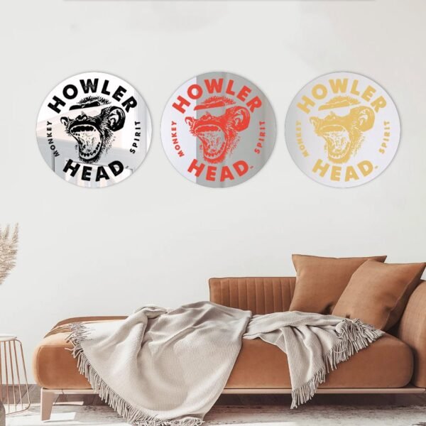 Three Howler Head Whiskey mirror signs in different sizes.