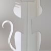 Cat-shaped mirror with 'Welcome' text in cursive.