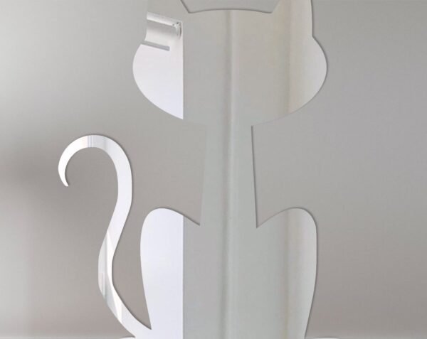 Cat-shaped mirror with 'Welcome' text in cursive.