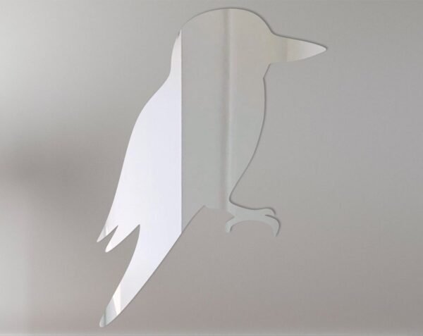 Kookaburra-shaped mirror with reflective glass and sign details.