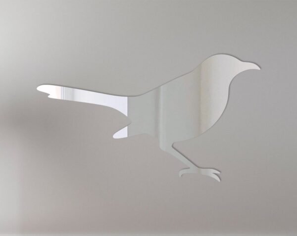 Reflective 'Mockingbird Mirror Sign' with elegant script and bird design.